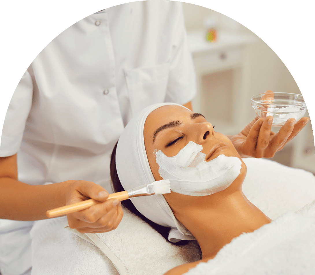 Woman receiving a relaxing facial mask