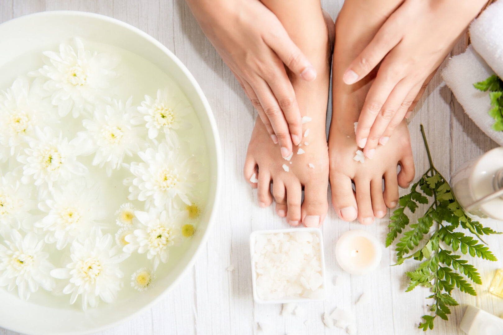 Spa foot soak with white flowers