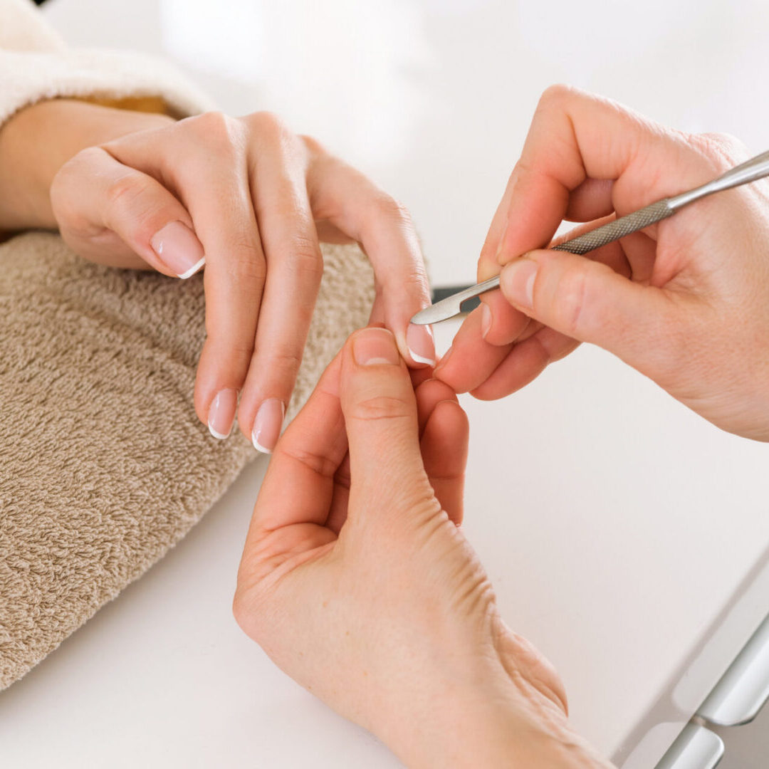 Nail treatment using cuticle pusher